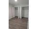Bedroom with triple closet, hard surface floors, and new paint at 3636 Salem St, Indianapolis, IN 46208
