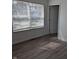 Bedroom featuring a window with blinds and neutral colored walls at 3636 Salem St, Indianapolis, IN 46208