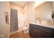 Bright bathroom features a shower-tub combination with modern fixtures and vanity at 7942 Beaumont Green Pl, Indianapolis, IN 46250