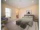 Large main bedroom offers carpet, natural light, sitting area, decor and a relaxing space to unwind at 7942 Beaumont Green Pl, Indianapolis, IN 46250