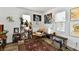 Cozy bedroom with lots of plants, bright natural light and interesting decor at 3612 Schofield Ave, Indianapolis, IN 46218