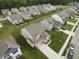 Aerial view of a home surrounded by lush greenery in a quiet neighborhood at 6748 Fallen Leaf Dr, Whitestown, IN 46075