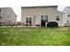 Large backyard with a patio, lawn, and fence, perfect for outdoor enjoyment and entertaining at 6748 Fallen Leaf Dr, Whitestown, IN 46075