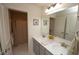 Well-lit bathroom with double sinks, gray cabinetry, and a shower with a curtain at 6748 Fallen Leaf Dr, Whitestown, IN 46075