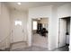 Bright foyer with a view into a home office with lots of natural light at 6748 Fallen Leaf Dr, Whitestown, IN 46075