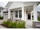 Inviting covered porch with stone accents and a bench at 6748 Fallen Leaf Dr, Whitestown, IN 46075