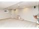Spacious basement with carpeting, recessed lighting, and a neutral color palette at 11193 Harriston Dr, Fishers, IN 46037