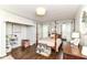 Bedroom featuring hardwood floors and decoratively designed furniture with a decorative doll house at 11193 Harriston Dr, Fishers, IN 46037