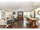 Inviting living room featuring vaulted ceilings, hardwood floors, and a cozy seating area at 11193 Harriston Dr, Fishers, IN 46037