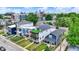 Aerial view of modern three-story home with rooftop balcony, complementing the neighborhood at 1218 Orange St, Indianapolis, IN 46203