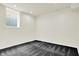Finished basement with neutral carpet, recessed lighting, and a window for natural light at 1218 Orange St, Indianapolis, IN 46203