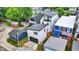 An aerial rear view of modern homes featuring sleek designs, balconies, and detached garages at 1218 Orange St, Indianapolis, IN 46203