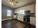 Eat-in kitchen features updated cabinets, stainless steel appliances, and ample countertop space at 1702 Barth Ave, Indianapolis, IN 46203