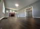 Bright living room with hardwood floors, a fireplace and an open floor plan for easy entertaining at 1702 Barth Ave, Indianapolis, IN 46203