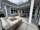 Spacious patio area featuring comfortable seating and dining spaces, perfect for outdoor gatherings at 11451 Neptune Dr, Fishers, IN 46040