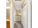 Hallway featuring neutral walls, carpet floors, and access to a bathroom and closet at 1024 Rotherham Ln, Beech Grove, IN 46107