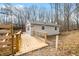 Home exterior with a ramp leading to the entrance in a wooded area at 6141 Flamingo Dr, Nineveh, IN 46164