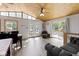 Inviting dining area with beautiful wood ceilings and sliding doors to deck, creating a warm and cozy atmosphere at 6141 Flamingo Dr, Nineveh, IN 46164