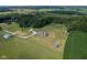 Expansive aerial view of a home with a large yard and wooded area at 9083 W Koger Ln, Martinsville, IN 46151