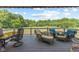 Spacious deck with comfortable seating and beautiful views of the surrounding greenery at 9083 W Koger Ln, Martinsville, IN 46151
