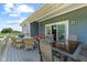 Covered deck with outdoor seating, providing a comfortable space for relaxation and entertainment at 9083 W Koger Ln, Martinsville, IN 46151