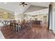 Large dining table perfect for entertaining, connecting the kitchen and living areas at 9083 W Koger Ln, Martinsville, IN 46151