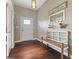 Inviting entryway with a charming bench and decorative accents at 9083 W Koger Ln, Martinsville, IN 46151