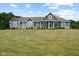 This beautiful single-Gathering home with a sprawling lawn and well-maintained landscaping at 9083 W Koger Ln, Martinsville, IN 46151