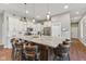 This gourmet kitchen features a large center island with barstool seating, stainless-steel appliances at 9083 W Koger Ln, Martinsville, IN 46151