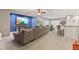 Relaxing living room boasts a large sectional sofa, bar, and a wall-mounted television at 9083 W Koger Ln, Martinsville, IN 46151