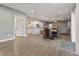 Open-concept living space featuring a modern kitchen, dining area, and comfortable seating at 9083 W Koger Ln, Martinsville, IN 46151