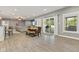 Inviting living space with sliding glass doors, a dining area, and comfortable seating at 9083 W Koger Ln, Martinsville, IN 46151