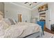 Tranquil main bedroom showing neutral tones, recessed lights, and ensuite bathroom access at 9083 W Koger Ln, Martinsville, IN 46151