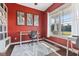 Bright office space with desk, chair, and large windows providing natural light at 9083 W Koger Ln, Martinsville, IN 46151