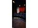 Home theater room with multiple rows of comfortable seating offers the perfect space to relax and watch movies at 9083 W Koger Ln, Martinsville, IN 46151