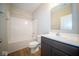 Full bathroom with tub, toilet and dark brown vanity at 1157 Paul Revere Dr, Mooresville, IN 46158