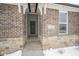 Front entrance with stone and brick details at 1157 Paul Revere Dr, Mooresville, IN 46158