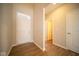 Bright foyer with wood floors and interior doors at 1157 Paul Revere Dr, Mooresville, IN 46158