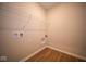 Laundry room with shelving and hookups for washer and dryer at 1157 Paul Revere Dr, Mooresville, IN 46158