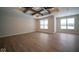 Open living space with hardwood floors and wood beams at 1157 Paul Revere Dr, Mooresville, IN 46158
