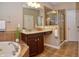 Elegant bathroom with soaking tub, shower, and double vanity at 621 Greenford W Trl, Carmel, IN 46032