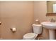 Clean and simple bathroom with pedestal sink and toilet at 621 Greenford W Trl, Carmel, IN 46032
