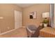Home office with a desk, chair, and closet at 621 Greenford W Trl, Carmel, IN 46032