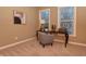 Bright home office features a desk, chair, and large windows at 621 Greenford W Trl, Carmel, IN 46032