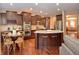 Modern kitchen with granite countertops, stainless steel appliances, and an island at 621 Greenford W Trl, Carmel, IN 46032