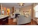 Spacious living room features a fireplace and hardwood floors at 621 Greenford W Trl, Carmel, IN 46032