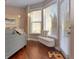 Sunlit living area with bay window and built-in window seat at 621 Greenford W Trl, Carmel, IN 46032