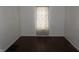 Bright dining room featuring hardwood floors and patterned curtains at 25 W Pennsylvania St, Shelbyville, IN 46176