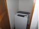 Compact laundry closet with top-load washer at 25 W Pennsylvania St, Shelbyville, IN 46176