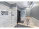 Bathroom with walk-in shower and modern fixtures at 2101 N Wolf Cv, Martinsville, IN 46151